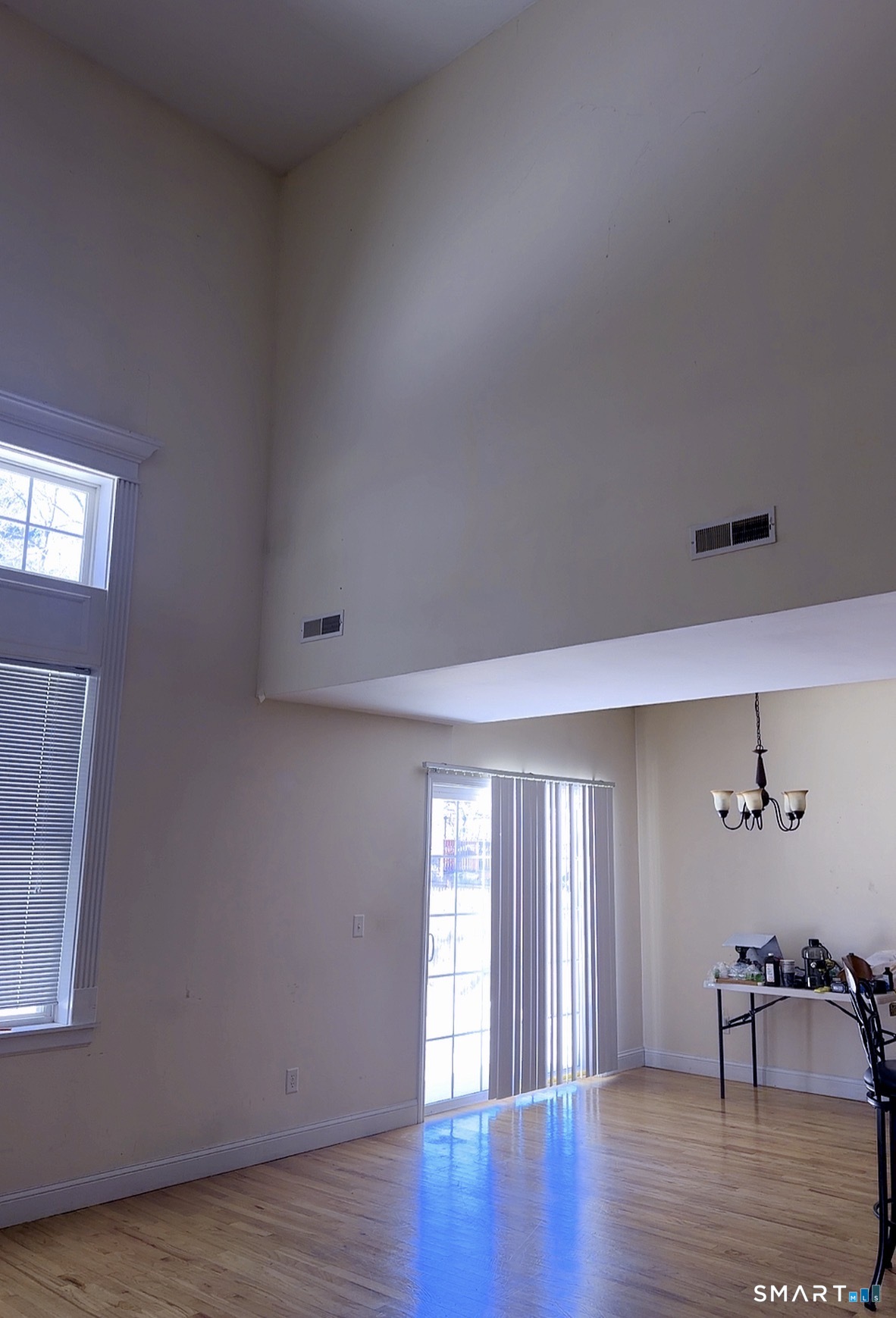 30 Delaware Avenue Waterbury, CT 06708 - Photo 3 of 5 a view of empty room with wooden floor and fan