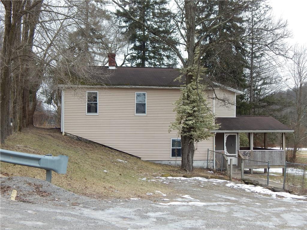 543 Oneida Valley Road Butler, PA 16001 - Photo 1 of 30 a front view of a house with a tree