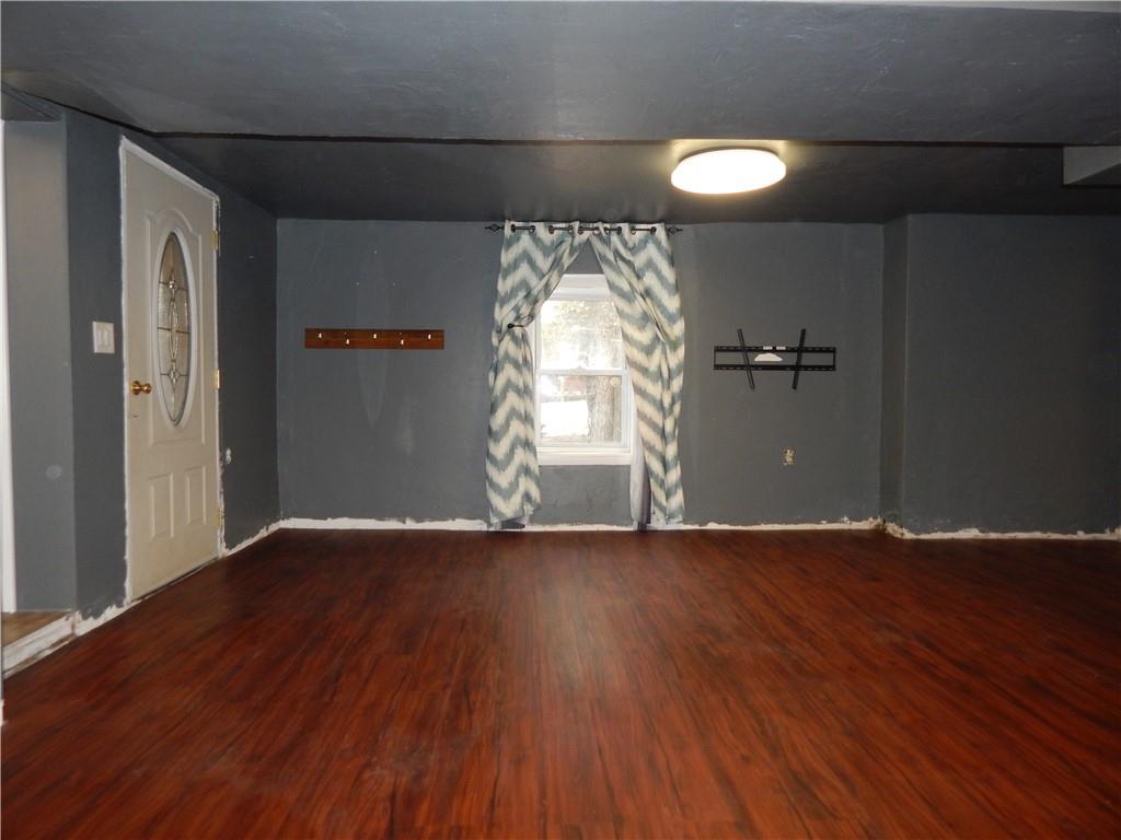 543 Oneida Valley Road Butler, PA 16001 - Photo 15 of 30 an empty room with wooden floor and windows