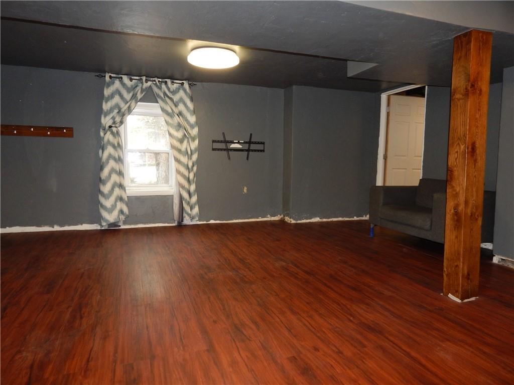 543 Oneida Valley Road Butler, PA 16001 - Photo 16 of 30 an empty room with wooden floor and windows