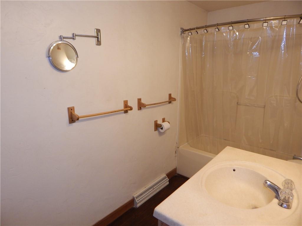 543 Oneida Valley Road Butler, PA 16001 - Photo 30 of 30 a bathroom with a sink and a mirror