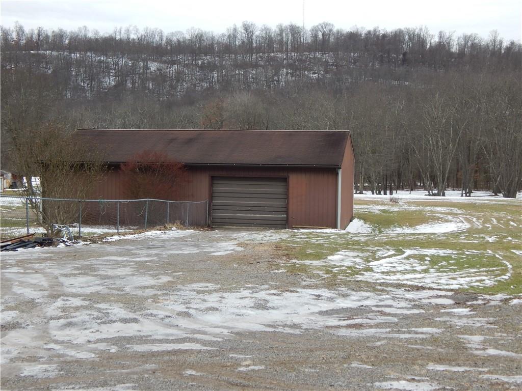 543 Oneida Valley Road Butler, PA 16001 - Photo 5 of 30 a front view of a house with a yard