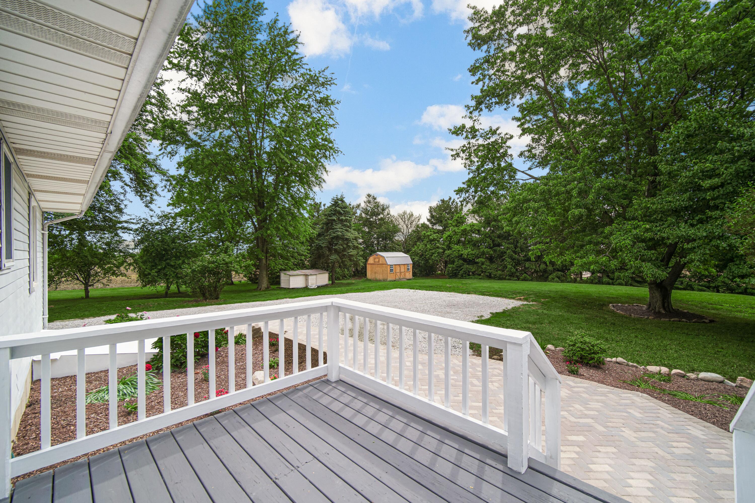 476 Highway 2 Hebron, IN 46341 - Photo 4 of 25 a view of deck with a garden