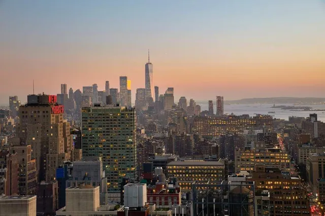 a bathroom with a tub sink and toilet