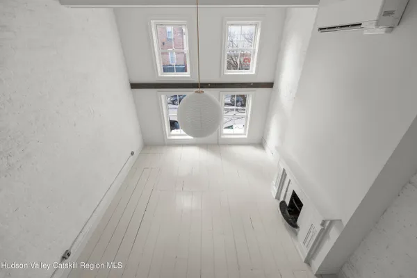 a view of a hallway with front door