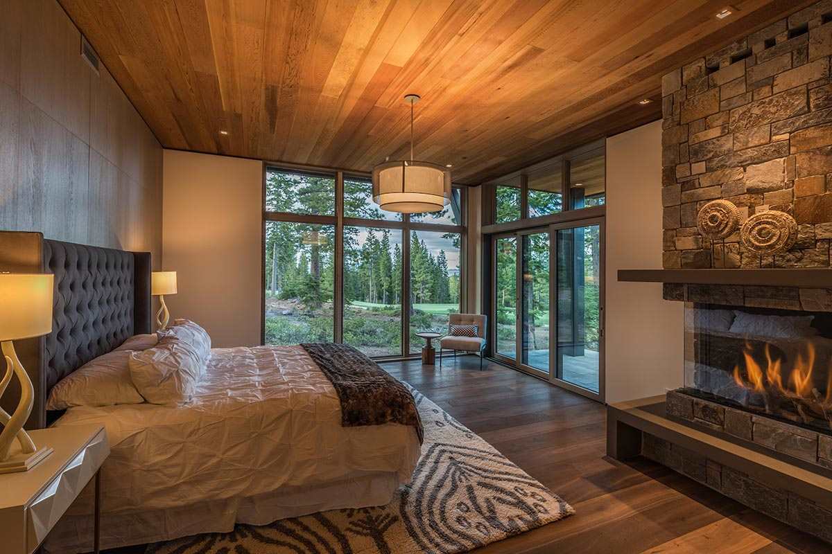 8348 Valhalla Drive Truckee, CA 96161 - Photo 6 of 14 a bedroom with a bed and wooden floor