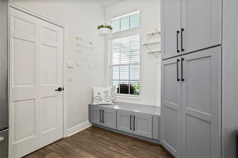 a bathroom with a window sink and shower