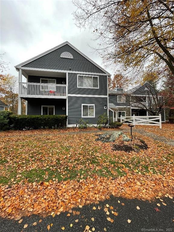 202 Windgate Circle, Unit F Monroe, CT 06468 - Photo 1 of 1 a front view of a house with garden