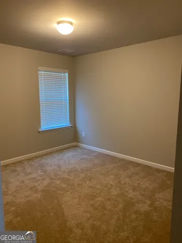 an empty room with a workbench