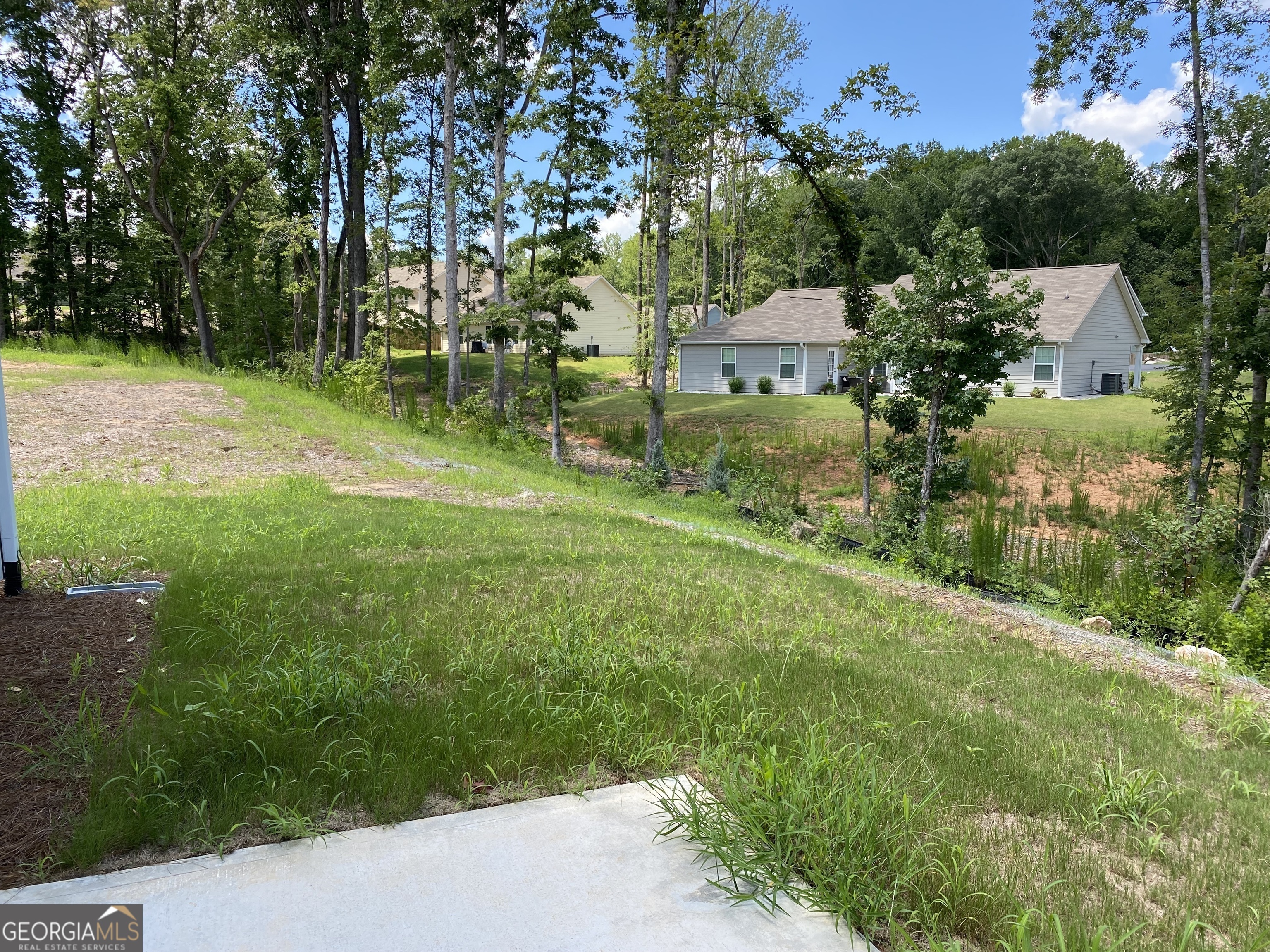 216 Finley Drive Commerce, GA 30529 - Photo 21 of 22 a view of backyard with green space