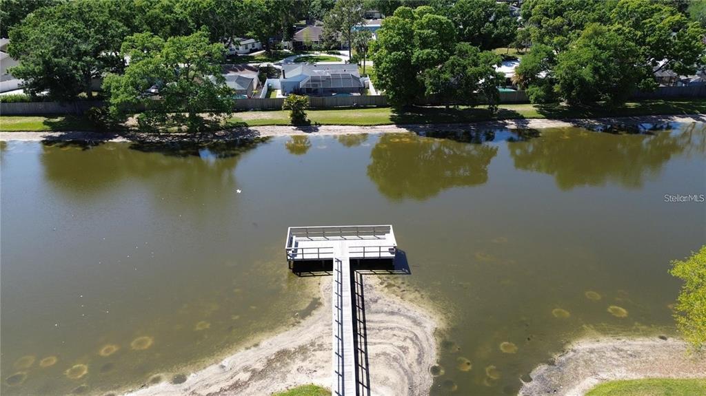 4511 South Oak Drive, Unit R32A Tampa, FL 33611 - Photo 25 of 27 a view of a lake with houses