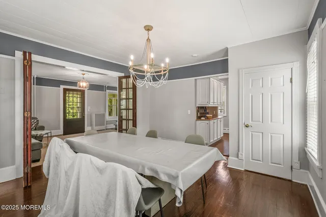 a view of a kitchen and a chandelier
