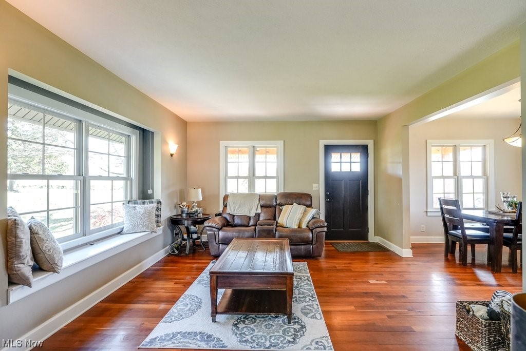 3417 Lake Rockwell Road Ravenna, OH 44266 - Photo 9 of 35 Living room featuring dark hardwood / wood-style floors