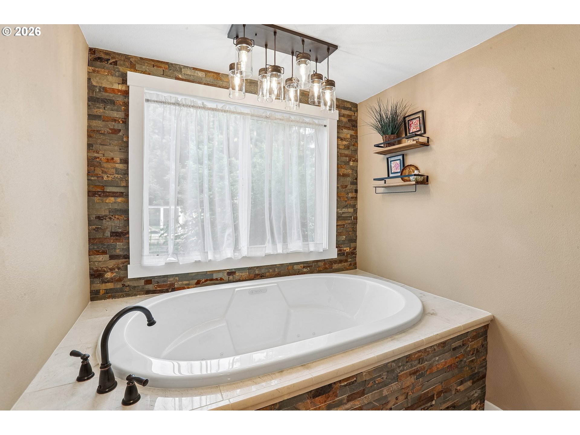 298 Roberson Road Woodland, WA 98674 - Photo 14 of 48 a bath tub sitting next to a bathroom