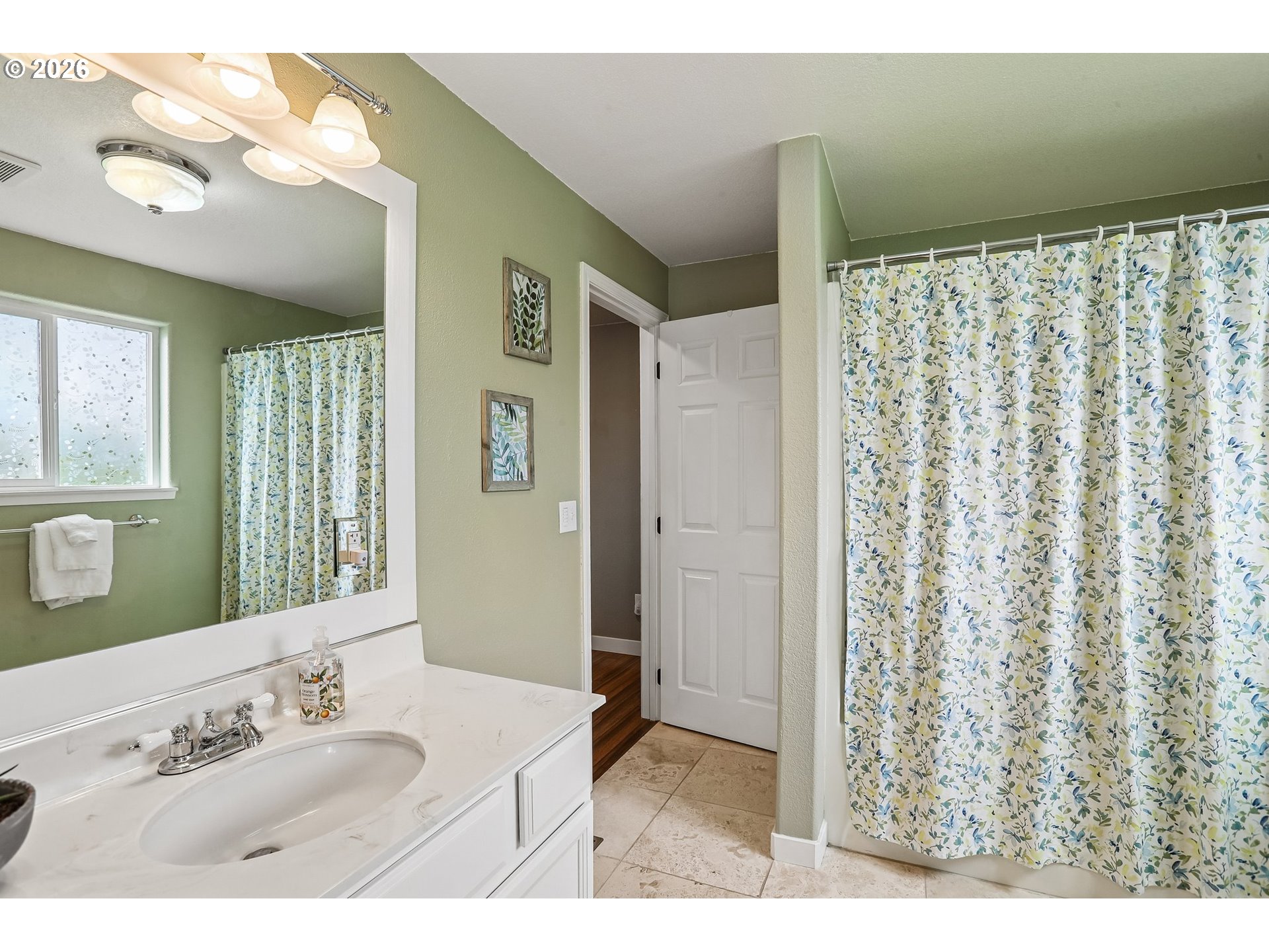 298 Roberson Road Woodland, WA 98674 - Photo 15 of 48 a bathroom with a sink a mirror and a shower