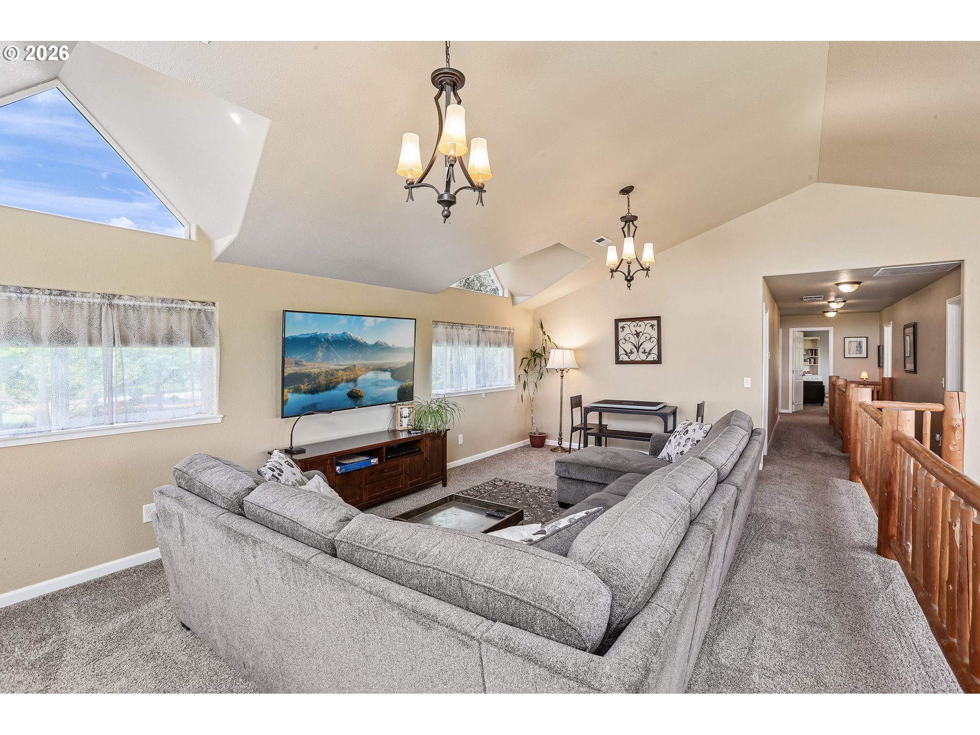 298 Roberson Road Woodland, WA 98674 - Photo 17 of 48 a living room with furniture and a flat screen tv