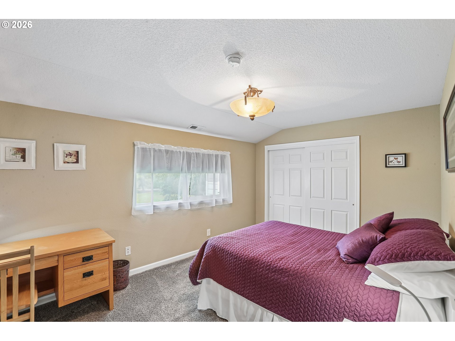 298 Roberson Road Woodland, WA 98674 - Photo 20 of 48 a bedroom with a bed and window