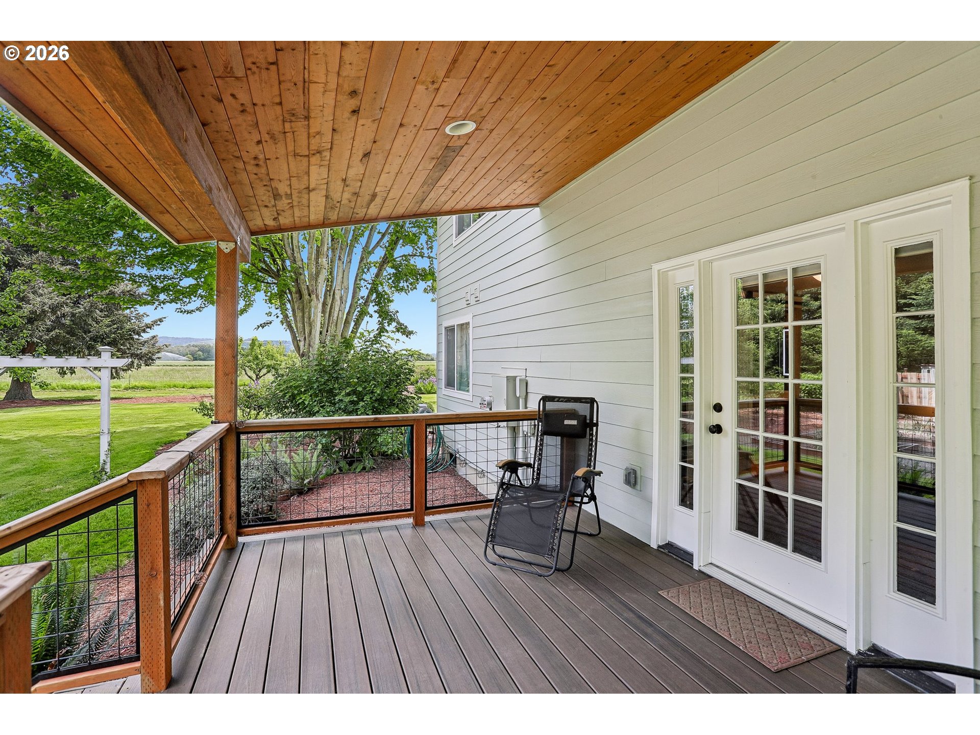 298 Roberson Road Woodland, WA 98674 - Photo 23 of 48 a view of a chairs and table on the wooden deck