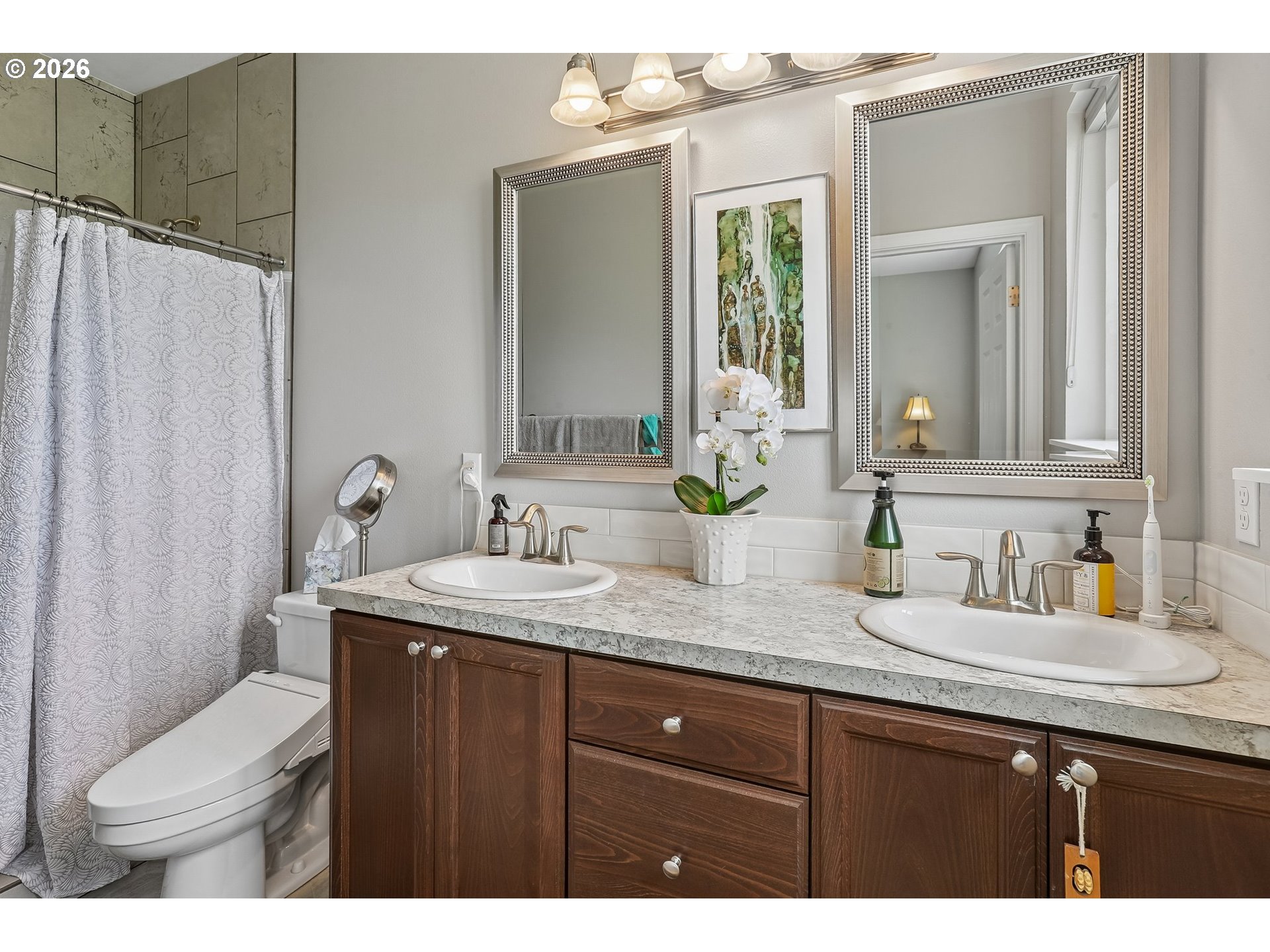 298 Roberson Road Woodland, WA 98674 - Photo 35 of 48 a bathroom with a granite countertop sink and a mirror