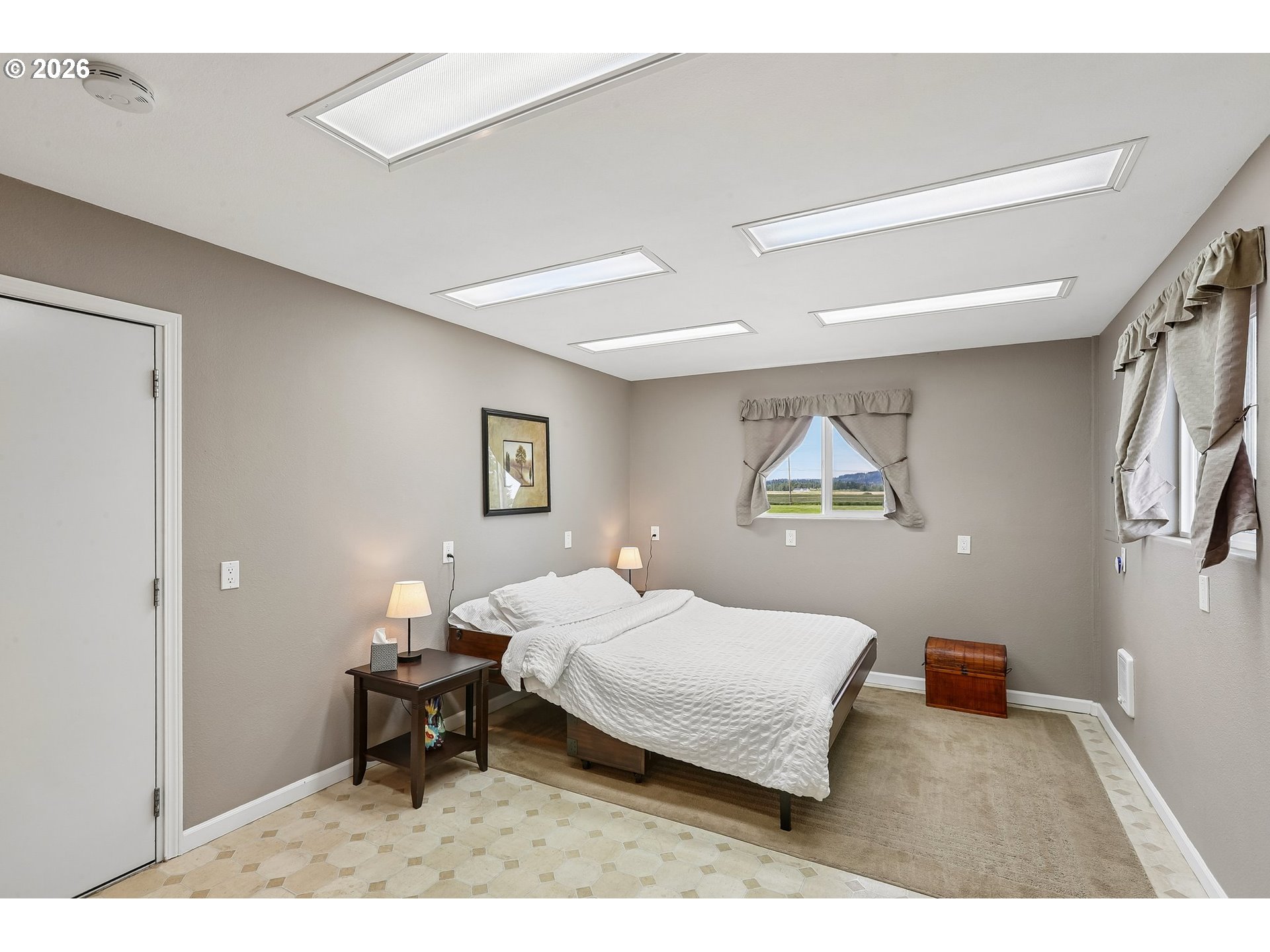 298 Roberson Road Woodland, WA 98674 - Photo 43 of 48 a bedroom with a bed and a table