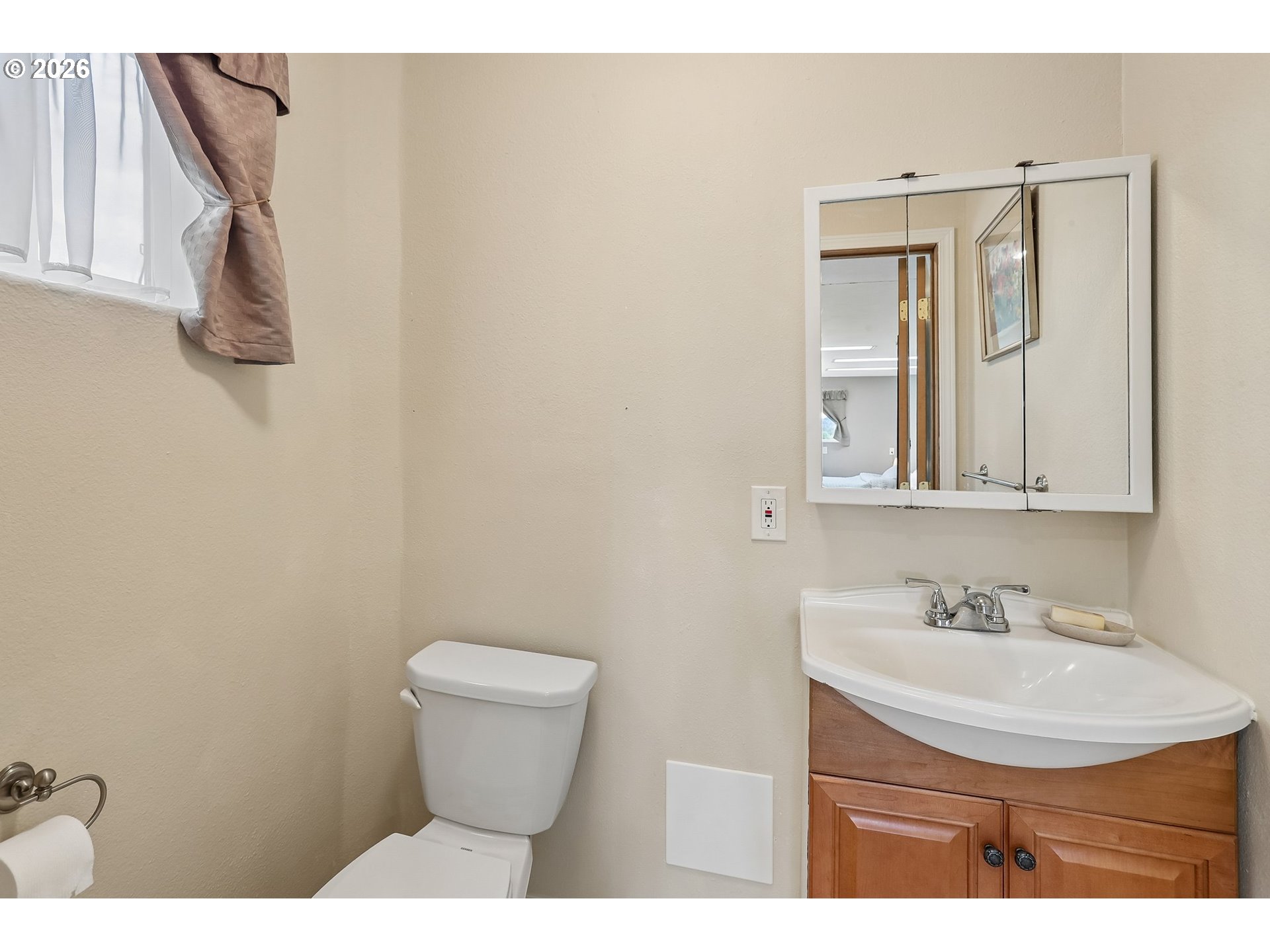 298 Roberson Road Woodland, WA 98674 - Photo 44 of 48 a bathroom with a sink a toilet and mirror