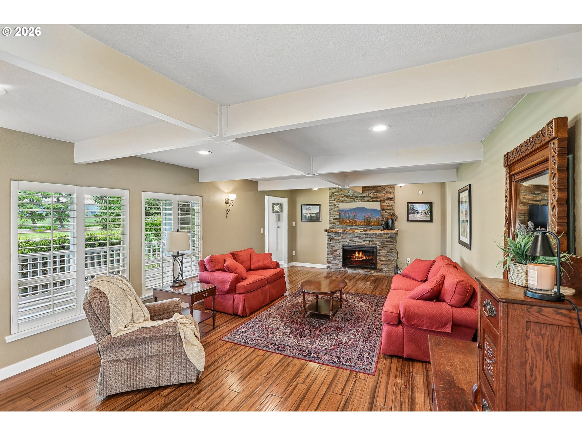 298 Roberson Road Woodland, WA 98674 - Photo 6 of 48 a living room with furniture a fireplace and large windows