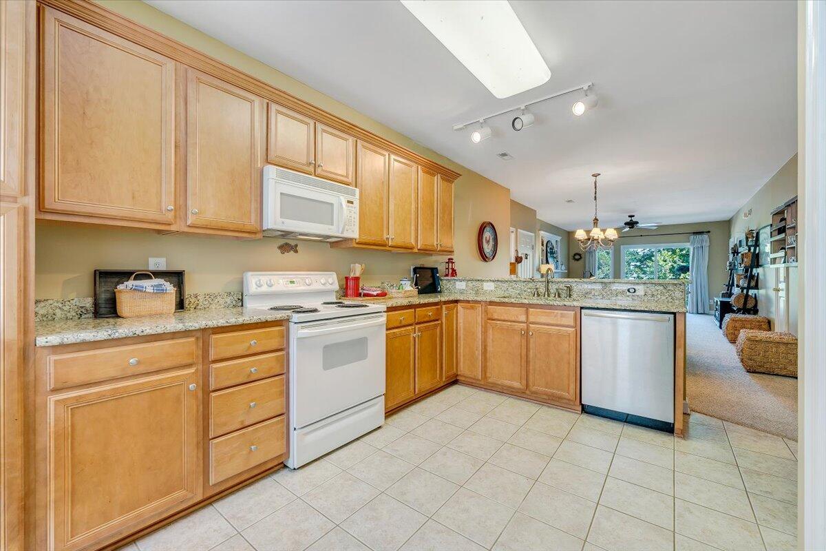 1209 Mariners Way, Unit 69 Huddleston, VA 24104 - Photo 21 of 72 a kitchen with appliances cabinets and a sink