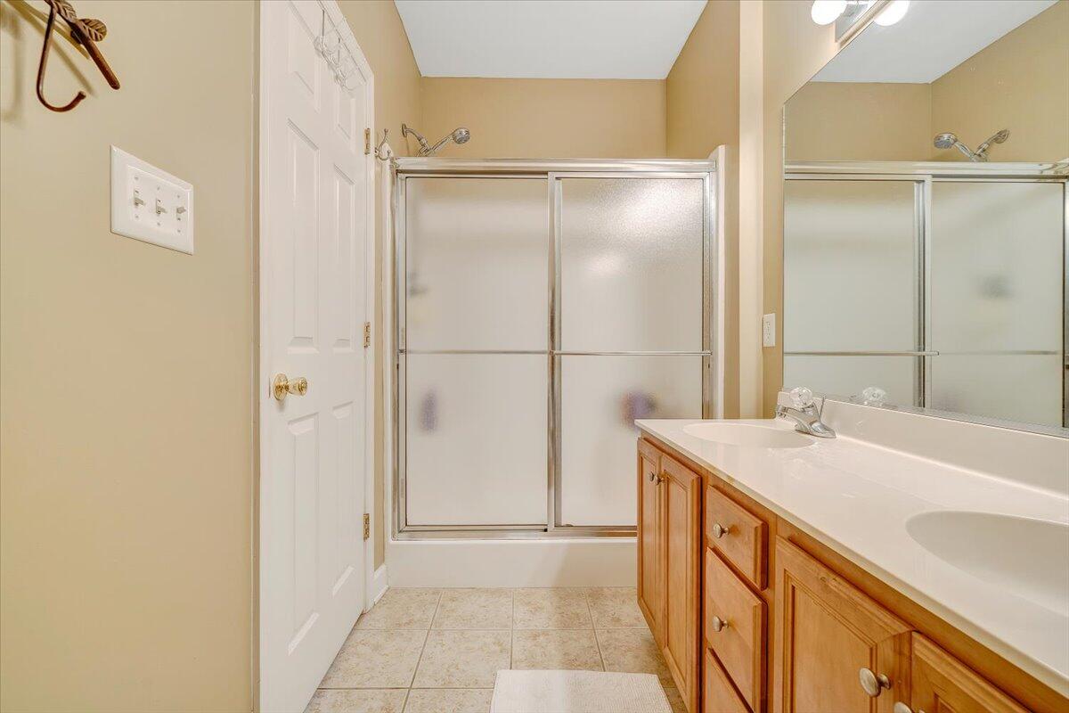 1209 Mariners Way, Unit 69 Huddleston, VA 24104 - Photo 30 of 72 a bathroom with a sink and a mirror