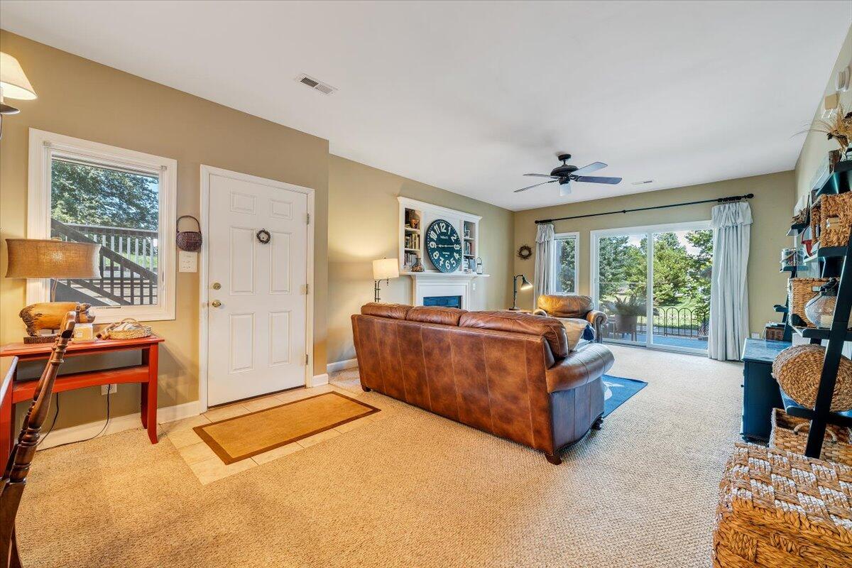 1209 Mariners Way, Unit 69 Huddleston, VA 24104 - Photo 3 of 72 a living room with furniture and a large window