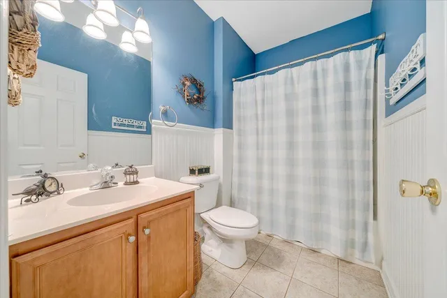 a view of a porch with a table and chairs