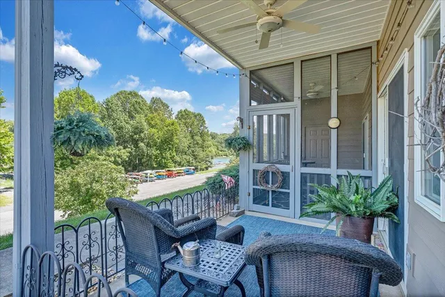 a view of a house with a backyard and a patio