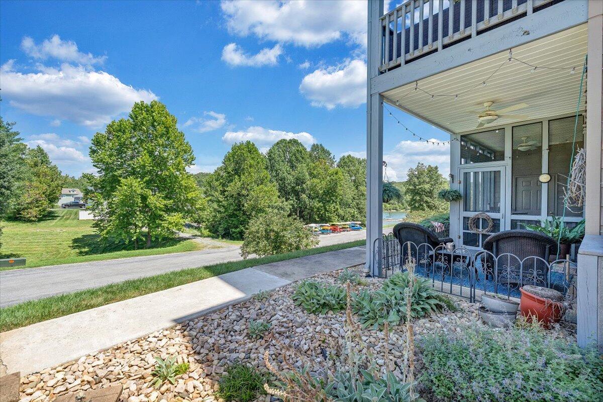 1209 Mariners Way, Unit 69 Huddleston, VA 24104 - Photo 35 of 72 a view of a house with backyard sitting area and garden