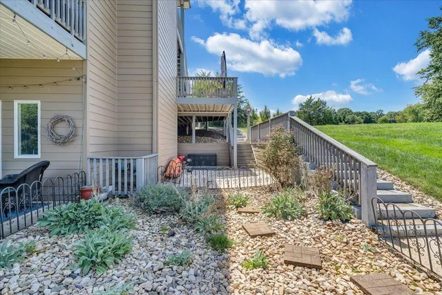 a view of a swimming pool with a yard