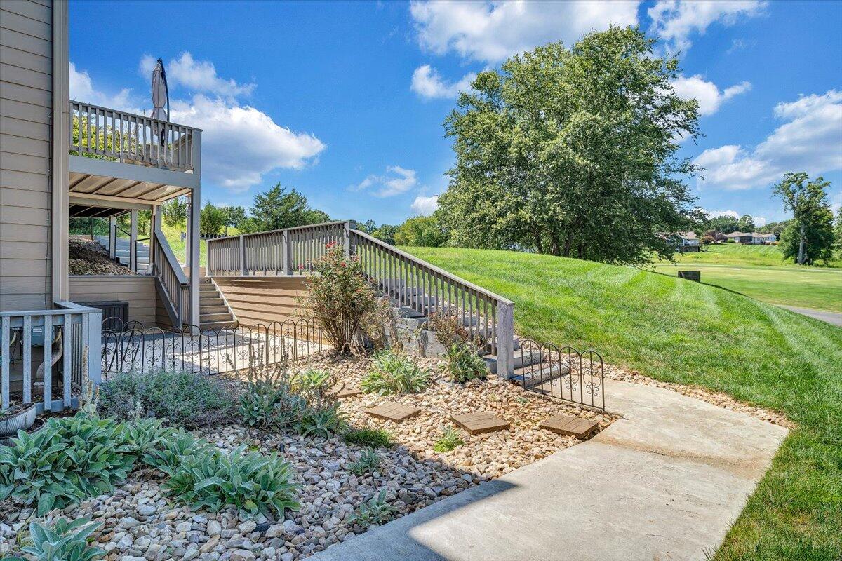 1209 Mariners Way, Unit 69 Huddleston, VA 24104 - Photo 40 of 72 a view of a pathway of a house with a yard