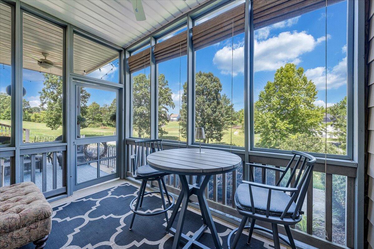 1209 Mariners Way, Unit 69 Huddleston, VA 24104 - Photo 42 of 72 a view of a dining room with furniture large windows and wooden floor