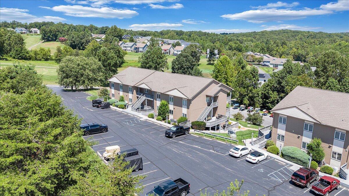 1209 Mariners Way, Unit 69 Huddleston, VA 24104 - Photo 70 of 72 an aerial view of multiple houses with a yard
