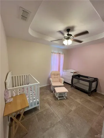 a room with furniture and a chandelier
