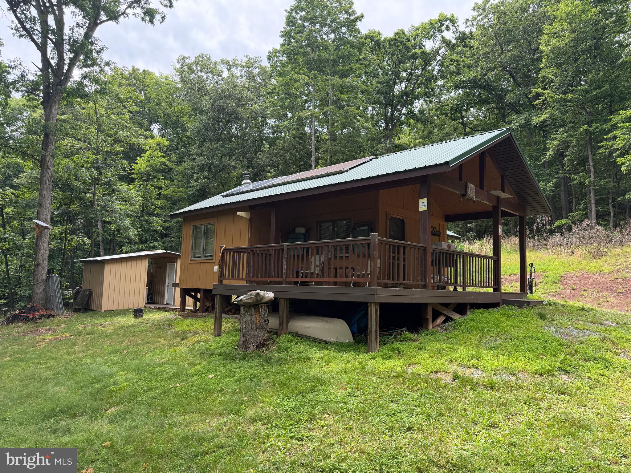 1419 Paul's Woods Road Delray, WV 26714 - Photo 72 of 105 a view of a house with backyard and a sitting area