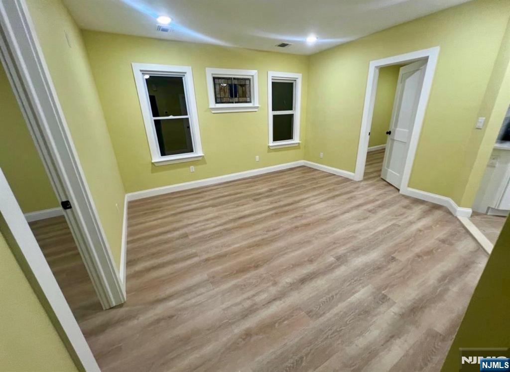 5 Chapman Street Bloomfield, NJ 07003 - Photo 5 of 5 a bedroom with a bed and a window