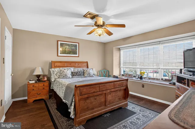 a bed room with a bed and a window