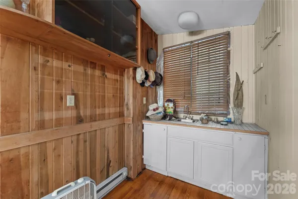 a bathroom with a sink and mirror