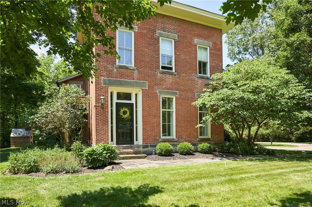 5046 Alger Road Richfield, OH 44286 - Photo 46 of 49 Two-story brick exterior with white window frames and stone sills