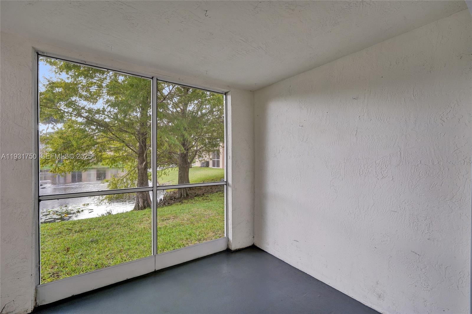 9833 Westview Drive, Unit 819 Coral Springs, FL 33076 - Photo 38 of 47 a view of a room with a large window
