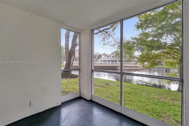 an empty room with sliding door
