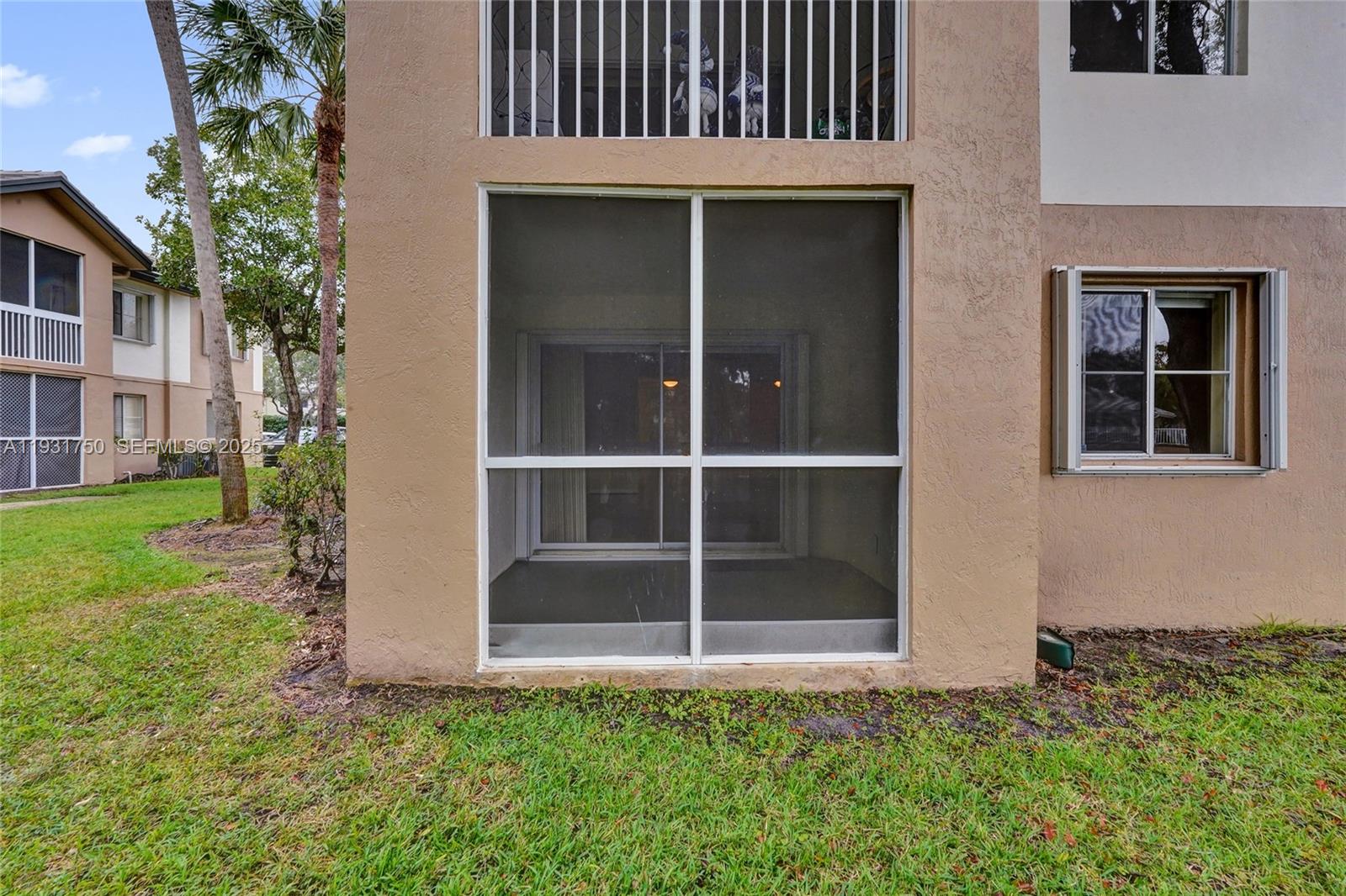 9833 Westview Drive, Unit 819 Coral Springs, FL 33076 - Photo 4 of 47 a view of front door of house