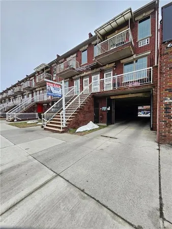 front view of a building with a street