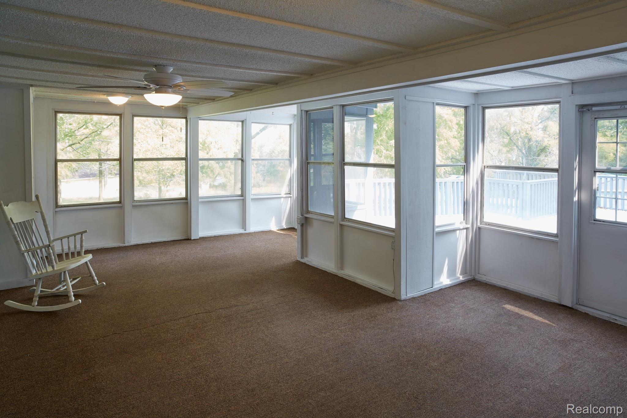 4268 Beecher Road Flint, MI 48532 - Photo 9 of 27 screened in porch.jpg