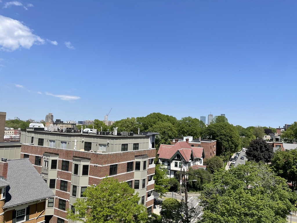 50 Longwood Avenue, Unit 611 Brookline, MA 02446 - Photo 6 of 8 a view of a city that has tall buildings