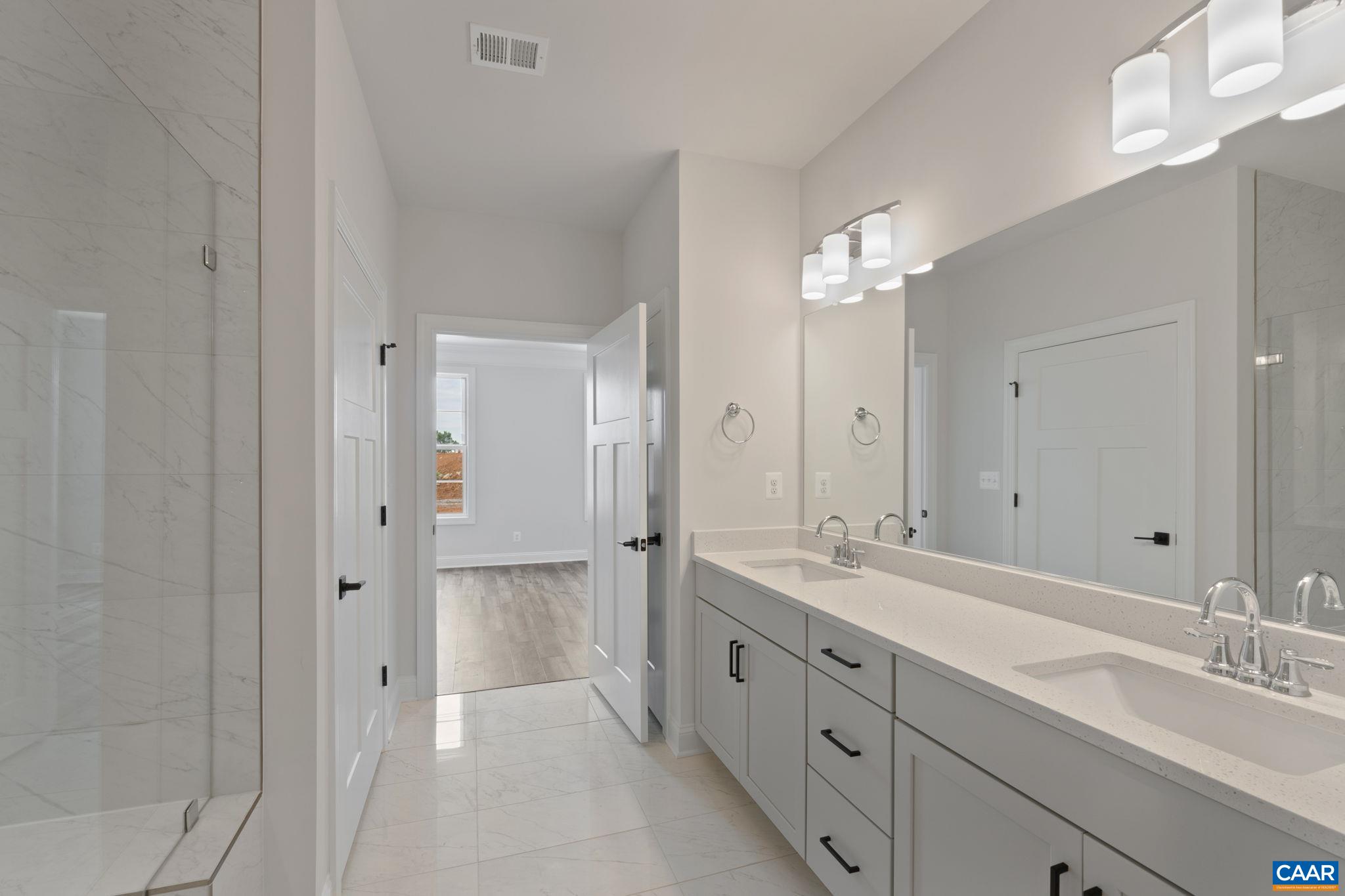 81 Springdale Road Waynesboro, VA 22980 - Photo 16 of 42 a spacious bathroom with a double vanity sink mirror and double