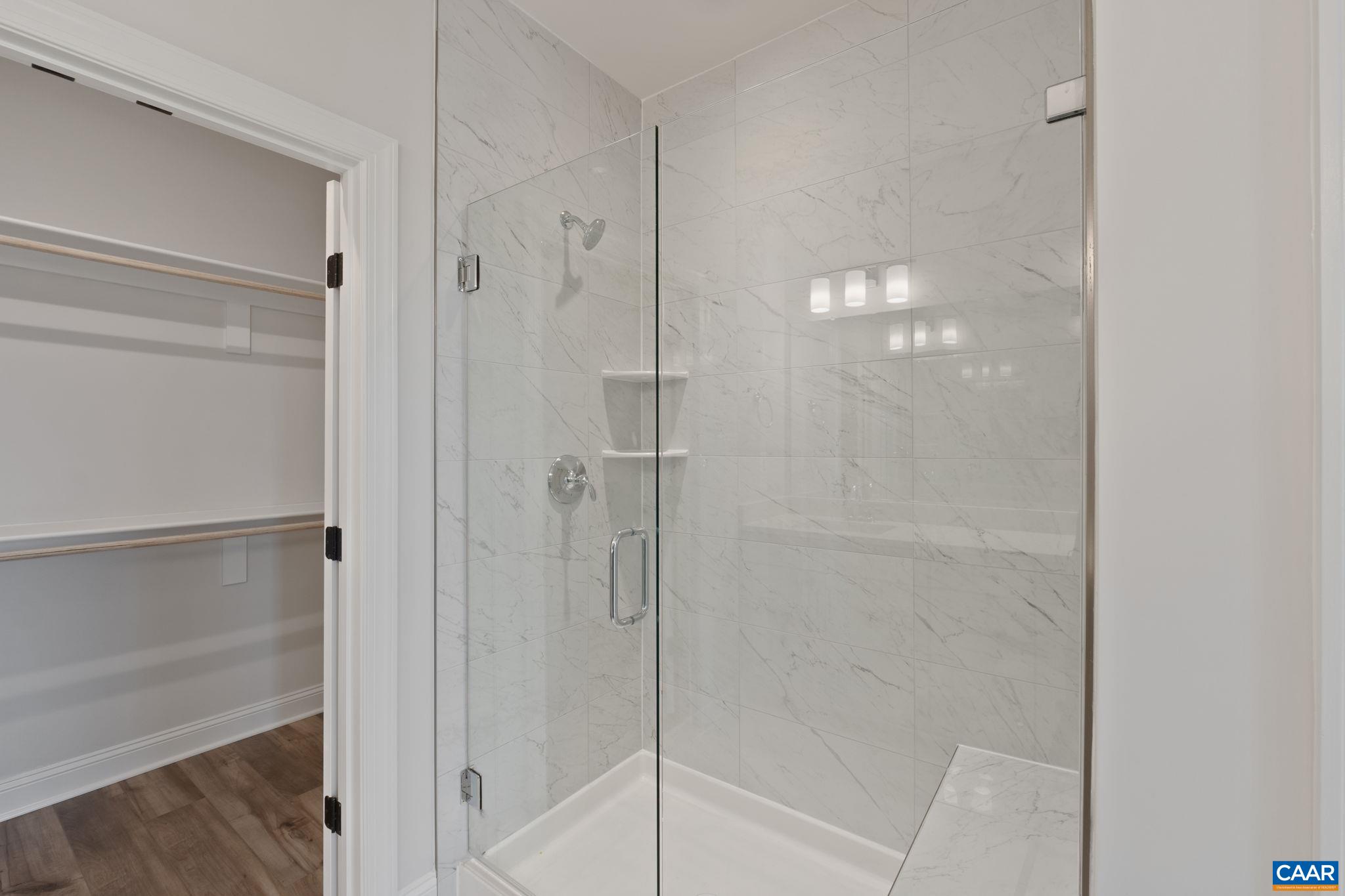 81 Springdale Road Waynesboro, VA 22980 - Photo 17 of 42 a bathroom with a glass shower door